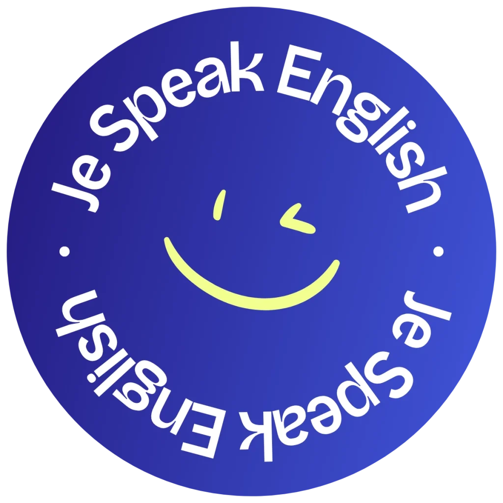 Badge rond Je Speak English avec un smiley au centre et le texte "Je Speak English" en demi-cercle autour